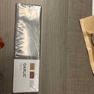 Garlic Press silver , new in box